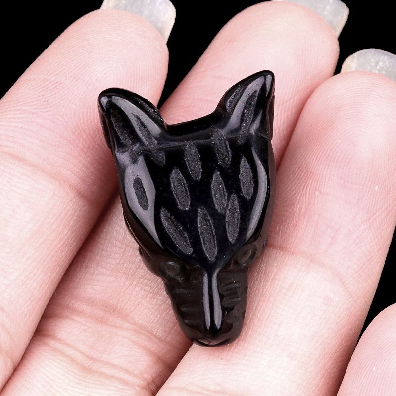 Hand-carved wolf head figurine made of natural amethyst, rose quartz, and tiger's eye—small animal ornament.