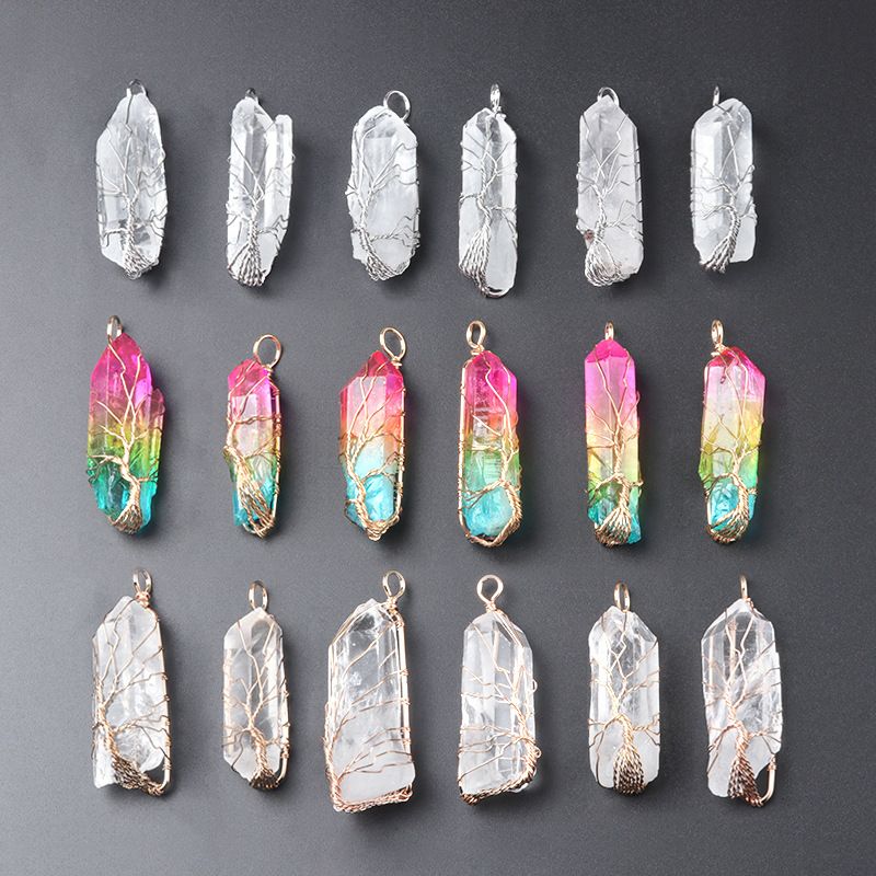 Wire-wrapped natural white quartz crystal point "Tree of Life" pendant with an iridescent electroplated finish.