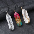 Wire-wrapped natural white quartz crystal point "Tree of Life" pendant with an iridescent electroplated finish.