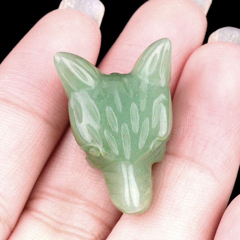Hand-carved wolf head figurine made of natural amethyst, rose quartz, and tiger's eye—small animal ornament.