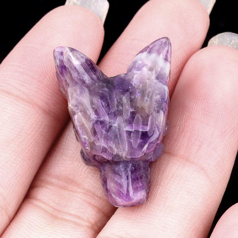 Hand-carved wolf head figurine made of natural amethyst, rose quartz, and tiger's eye—small animal ornament.