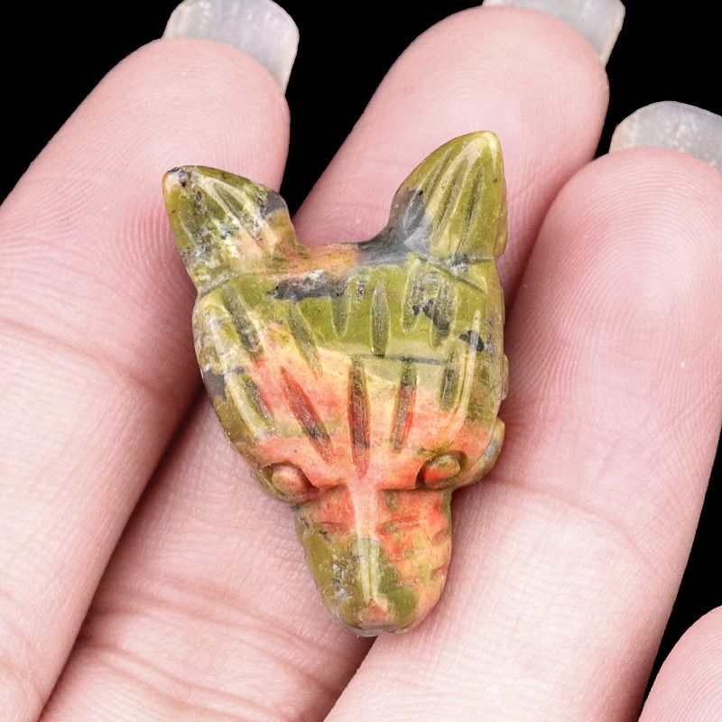 Hand-carved wolf head figurine made of natural amethyst, rose quartz, and tiger's eye—small animal ornament.