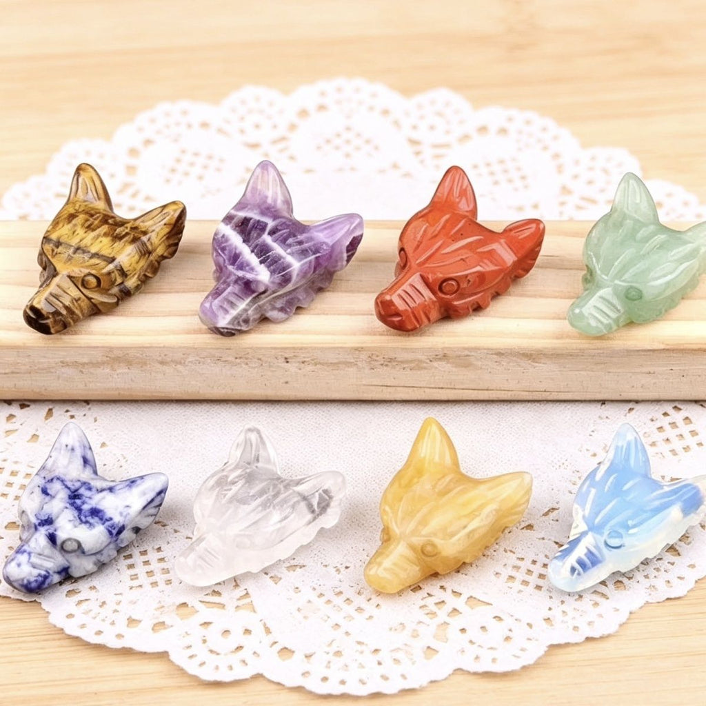 Hand-carved wolf head figurine made of natural amethyst, rose quartz, and tiger's eye—small animal ornament.